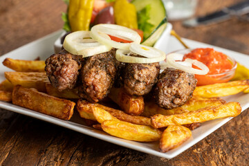 cevapcici with french fries - 579157158