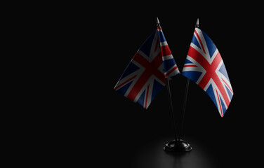 Small national flags of the United Kingdom on a black background