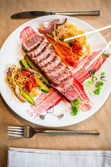 grilled tuna with sautéed vegetables