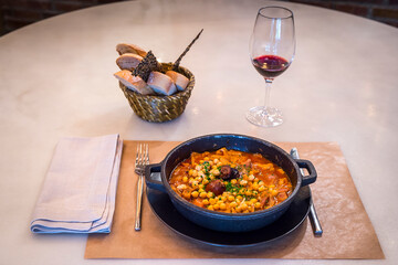 chickpea stew with chorizo and blood sausage, typical Spanish dish