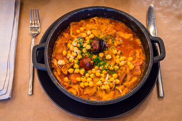 chickpea stew with chorizo and blood sausage, typical Spanish dish