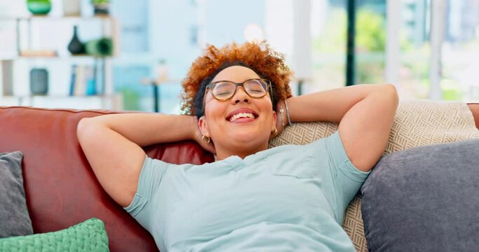Relax, calm and rest with black woman on sofa for wellbeing, peace and happiness. Break, comfortable and wellness with girl in living room at home for stress free, positive and freedom on weekend