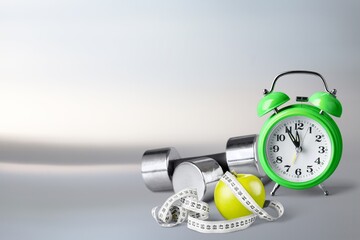 Retro alarm clock with exercise equipment