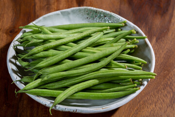 Raw fresh organic green beans ready to cook