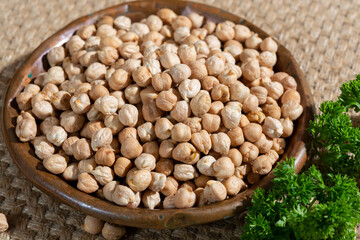 Portion of dried uncooked chick peas close up