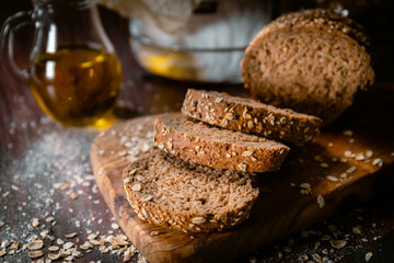 Bakery shop products - various kinds of baguette, bagel, donut, croissant, rolls, bread, puff pastry, powdered sugar delicious pies. Neutral background. Food from bakeries.