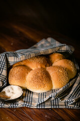 Bakery shop products - various kinds of baguette, bagel, donut, croissant, rolls, bread, puff pastry, powdered sugar delicious pies. Neutral background. Food from bakeries.