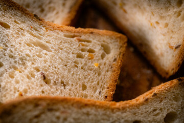 Bakery shop products - various kinds of baguette, bagel, donut, croissant, rolls, bread, puff pastry, powdered sugar delicious pies. Neutral background. Food from bakeries.
