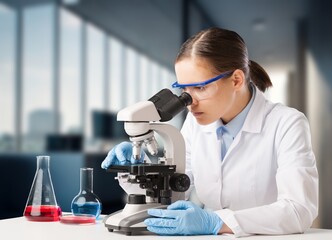 Modern Research Laboratory: Scientist work with Microscope