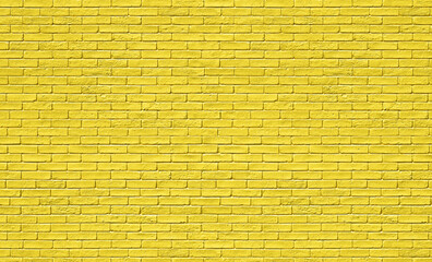 yellow brick wall in spring. Stones for a modern concept background with copy space