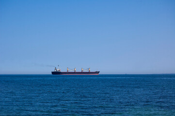 cargo ship sailing on the ocean