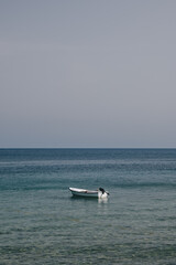 Fototapeta na wymiar A lonely boat on the sea