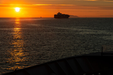 Freighter sailing out of Puget Sound into the Pacific Ocean; British Columbia