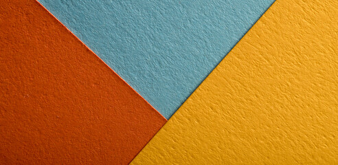 Fototapeta premium texture of multi-colored paper macro with lines.close-up of cardboard paper in different colors and shades for wallpaper banner background
