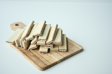  stack of wafer roll chocolate on white background 