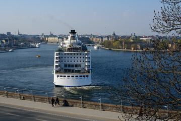 Stockholm. A cruise ship is sailing in the water.