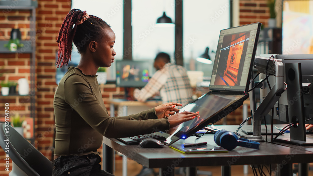 Poster african american woman designing game interface on computer with touchscreen display, working on 3d 
