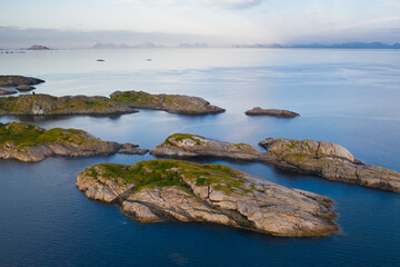 Obraz premium Aerial view of rocky islets, in Henningsvær, Lofoten Archipelago, Norway