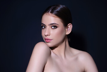 Beautiful woman with clean fresh skin on studio background. Face care, facial treatment, cosmetology, beauty and spa. Skin care. Woman with beauty face healthy skin, studio portrait.