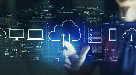 Cloud computing with young man touching a digital screen at night