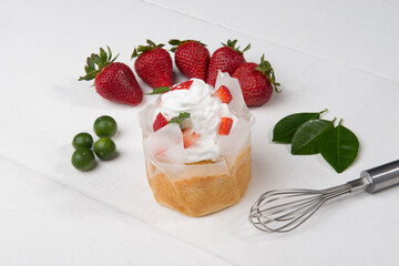 dessert with cream and strawberries