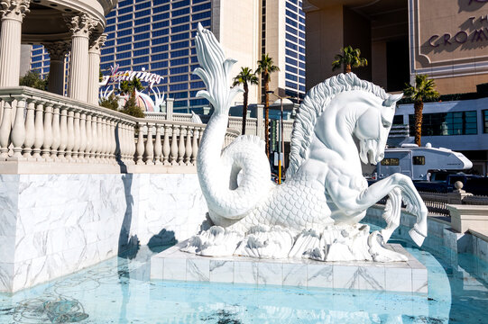 Plaza of Caesar's Palace in Las Vegas. Horse fish and fountain in the center of the capital of entertainment.