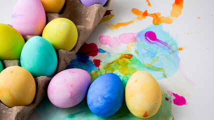 Fototapeta na wymiar Colorful background wit easter eggs and copy space