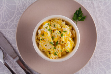 Scrambled Eggs with Seasonings in Bowl