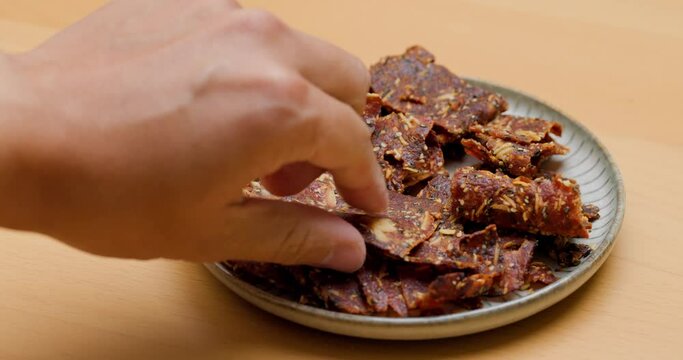 Pile of sliced crispy pork jerky