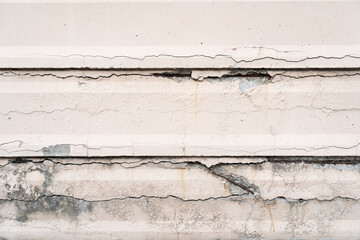 concrete crack wall background. cracked weathered concrete background