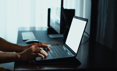  working late on laptop at home