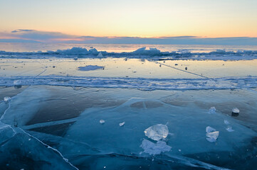 Scenic View of Sunset Over Frozen Lake Baikal in Winter