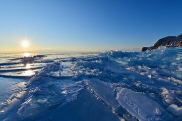 Starburst Over Field of Ice Formations at Cape Khoboy of Frozen Lake Baikal in Eastern Siberia
