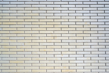Background from a beige clinkered wall