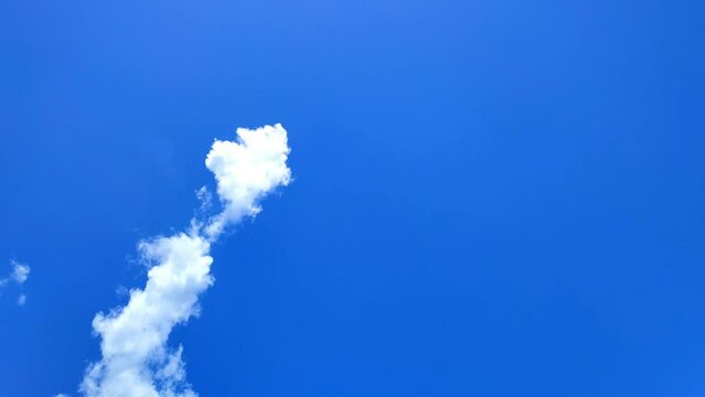 blue sky with clouds. cloud timelipse bright blue sky background. white cloud hyperlipse. summer weather in the countryside. no people.
