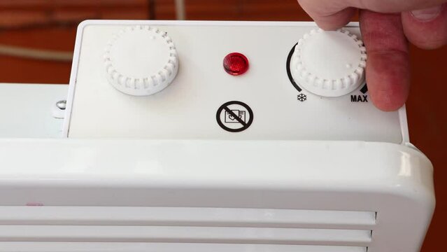 At beginning of heating season, thermostat dial on convector heater turns to maximum heating position.