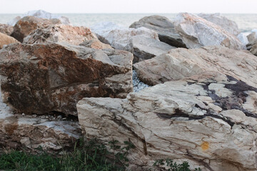 Uncut stones on the Mediterranean coast