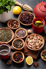 Various dried tea and teapot