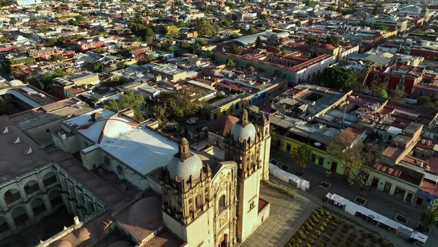 Oaxaca, Mexico. Aerial View of Cityscape and Santo Domingo de Guzman Church on Golden Hour Sunlight, Drone Shot
