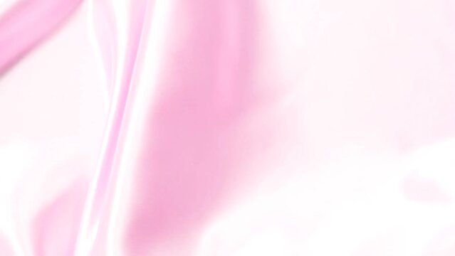 動くピンクのサテン布　スローモーション　ハイスピード撮影　背景素材