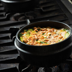 Stew boiling in an earthenware pot