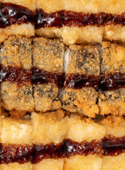 Baked Japanese rolls as background.