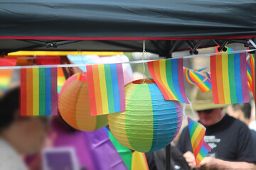Sydney, NSW  Australia - February 19 2023: Rainbow bunting and lanterns hung from a stand. WorldPride