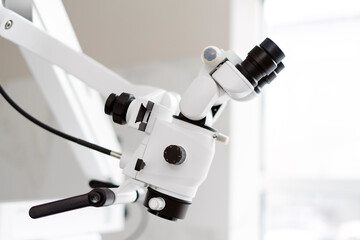Dental microscope, equipment for a professional dentist. The modern dental office is equipped with modern equipment.