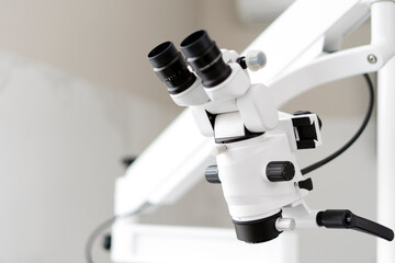 Dental microscope in a dental clinic. The modern dental clinic has professional equipment.