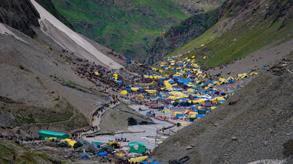 AMARNATH, JAMMU and KASHMIR, INDIA, JULY 06, 2022: Holy Amarnath Cave in Kashmir Himalayas. It is a...