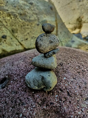 Fototapeta na wymiar Stack of stones balancing on the river