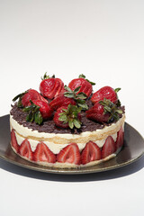 Strawberry cheesecake dessert on white background