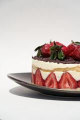 Strawberry cheesecake dessert on white background