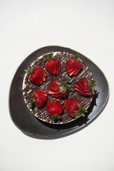 Strawberry cheesecake dessert on white background